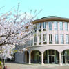 view of Marian Hall at the new TUJ campus in Kyoto with cherry blossoms blooming