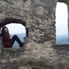 Miquela Berge photo sitting in a stone fort