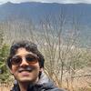 photo of Abhi Bolisetti with landscape in the background