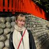 Photo of Kelsea in front of the Fushimi Inari Taisha Shrine in Kyoto, Japan